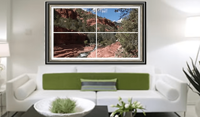 A Cozy Living Room Featuring a Large Picture of a Serene River on the Wall, Enhancing the Tranquil Atmosphere.