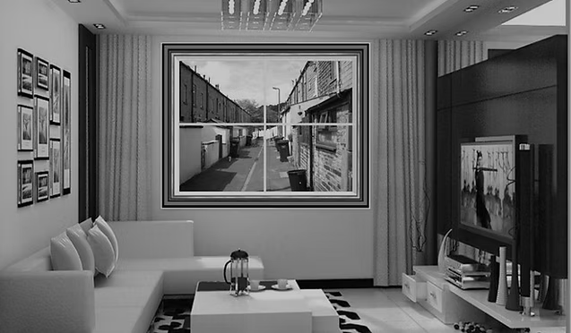 A Black and White Photo Depicting a Cozy Living Room With a Sofa, Coffee Table, and Decorative Elements.